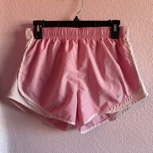 Pink Nike running shorts